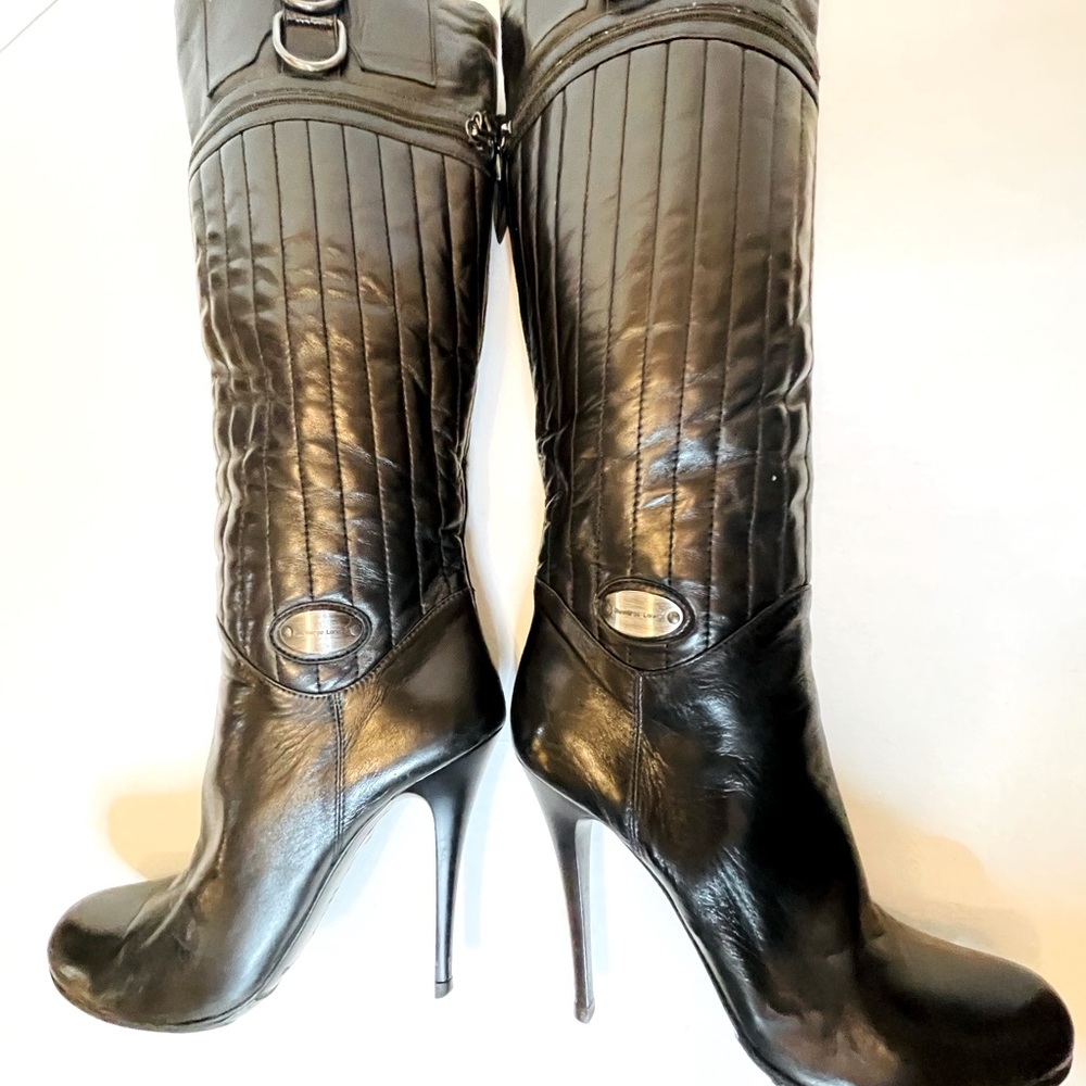Gianmarco Lorenzi slip-on soft black leather boots with zipper compartments.